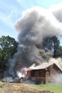 Smoke could be seen billowing from the fire at 350 Pleasant Valley Road Thursday afternoon. 