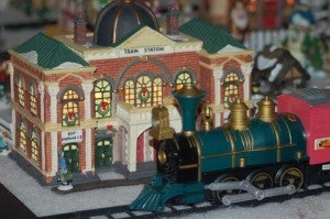 A Christmas village with over 50 lighted houses is a favorite of young and old alike. Here the Santa train makes a stop for Christmas travelers. 