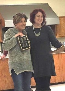 Darlington Heights Volunteer Fire Department Auxiliary member Reannan Tinsley, right, presented the Dolly Childress Award for Community Service to Teresa Lewis.
