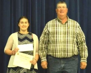 Gillian Cubbage was the recipient of a PFSWCD scholarship; also pictured is Todd Smith, PFSWCD chairman.
