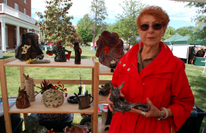 Artist June Martin, of Forest, displays a sculpture.
