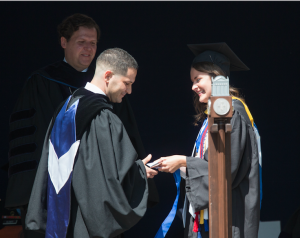 Dr. Michael Mucedola received the Student-Faculty Recognition Award. Pictured presenting him with the award is Hailey Gilbert. Reveley looks on at left, while Dr. Jim Jordan looks on at right.