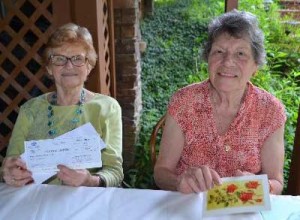 Nan Colvin, left, received the Benchmark Bank Award, and Judy Jamieson received the Ruth Adams Award.