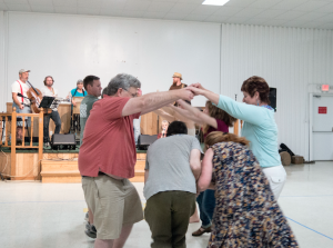 CARSON REEHER | HERALD The band taught those in attendance how to perform a variety of dances, including circles, reels and flatfoots.