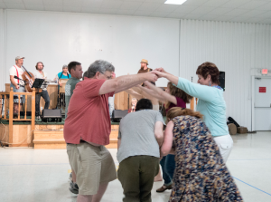 CARSON REEHER | HERALD The band taught those in attendance how to perform a variety of dances, including circles, reels and flatfoots. 