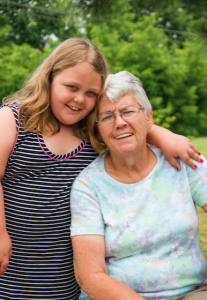 CARSON REEHER | HERALD  Elaine Davenport poses with her granddaughter, Crista Hunt, who rode to school daily with Davenport.