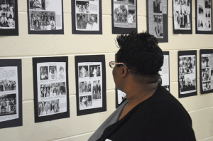 MARGE SWAYNE | HERALD A wall of fame — Pam Gray looks over a wall full of memories from Nancy Anderson Haga’s years of coaching Forensics and Debate at Prince Edward Academy/Fuqua School.