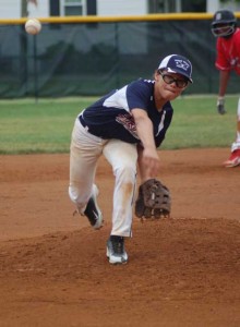 PEFYA All-Star Nate Reed, pictured pitching against the Dinwiddie National All-Stars on Sunday, hit a grand slam on Tuesday against the same team in the Dixie Youth District 5 Major League All-Star Tournament championship game in Blackstone. (Photo by Titus Mohler)