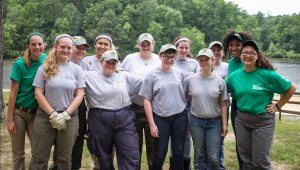 Members of the Virginia State Park Youth Conservation Corps pose at Twin Lakes State Park during their third week of volunteering. Pictured are, from left, front row, Lyddia Stanley, Daisy Jess Ball, Ivy Solomon, Ashley Miller, Monica Ford, back row, Laura Hickey, Ashley Johnson, Camila Vargas, Bobbi Jones, Maddie Talnagi, Bailey Teague and Alexa Weeks. (Photo by Carson Reeher)