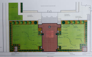 According to the second plan, without the addition of secondary pathways, the marker and memorials would be moved closer to Main Street, making it easier for pedestrians to read the signs.