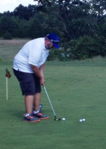 Jason Toombs, of the Haley Auto Mall team, sank a beautiful 30-foot putt at the clubhouse green to win the first ever putting contest during the Farmville Lions Club’s annual golf tournament.
