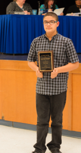 Angel Daniel Henriquez poses with his Cumberland County Middle School student of the month award.