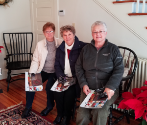 CHAMBER OF COMMERCE Visiting with each other during Saturday’s Farmville Area Chamber of Commerce Holiday Tour of Homes are, from left, Deanna Purser, Roberta Foster and Betty Vanderpool as they visit the “White House” at 900 High St.