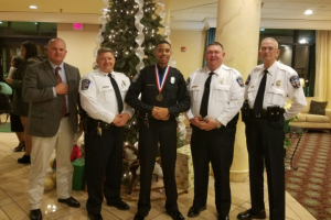FARMVILLE POLICE DEPARTMENT Officer Peter Carter, middle, stands with the leadership of the Farmville Police Department. Pictured are, from left, Detective Sgt. Chris Moss, Capt. Bill Hogan, Carter, Chief A.Q. “Andy” Ellington and Lt. John Garrett.