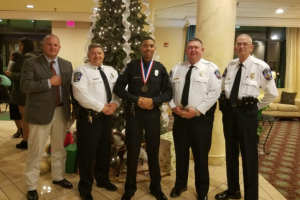 FARMVILLE POLICE DEPARTMENT Officer Peter Carter, middle, stands with the leadership of the Farmville Police Department. Pictured are, from left, Detective Sgt. Chris Moss, Capt. Bill Hogan, Carter, Chief A.Q. “Andy” Ellington and Lt. John Garrett. 