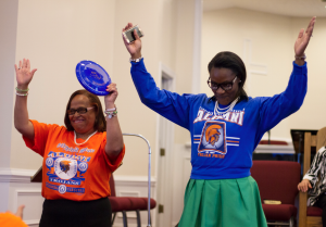 Joyce Gregory Booker, left, and Sonia Evans celebrate being Virginia State University alumnae.