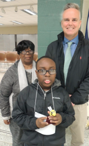 Division Spelling Bee winner Chance Woodson, front, a sixth-grader at Buckingham County Middle School, holds his “bee” award with Dr. Cecil Snead, division superintendent and his proud grandmother, Rozena Woodson. 